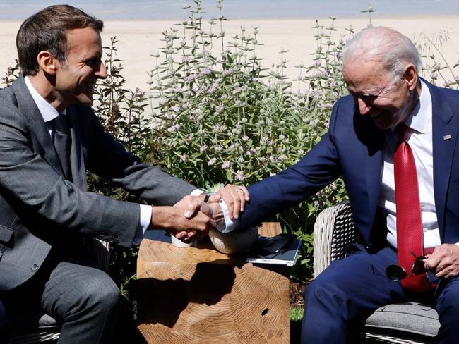 Happier times – France's President Emmanuel Macron (L) greets US President Joe Biden before a bilateral meeting during the G7 summit in Carbis bay, Cornwall in June this year. Picture: Ludovic MARIN / AFP