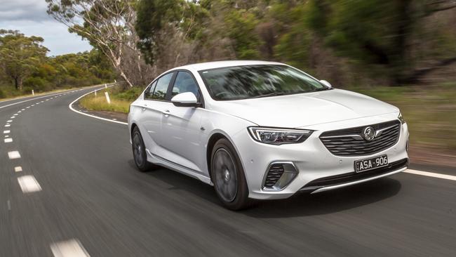 German Holden Commodore takes on new Toyota Camry and updated Subaru ...