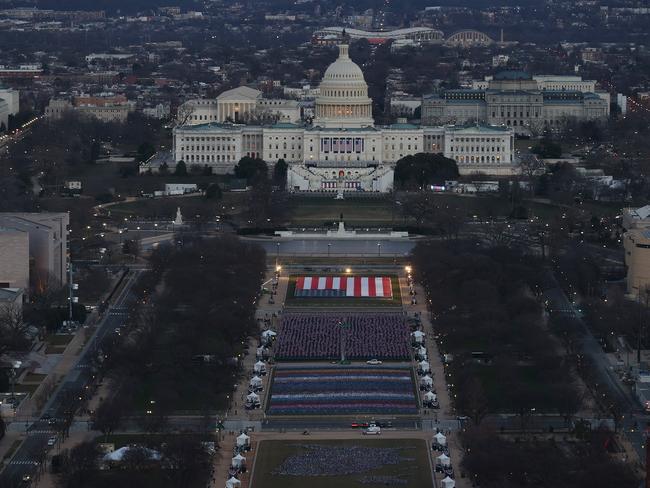 The US Capitol Building is prepared for the inauguration ceremonies for President-elect Joe Biden as the "Field of Flags" are placed on the ground on the National Mall. Picture: AFP