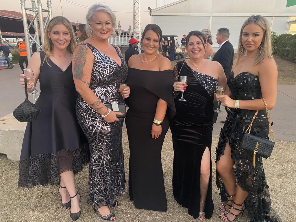 Klarin Sivyer, Emma Brown, Sylvia Panatos, Sara Braines-Mead and Simone Douglas enjoy the 2022 Darwin Cup Gala Ball. Picture: NT News