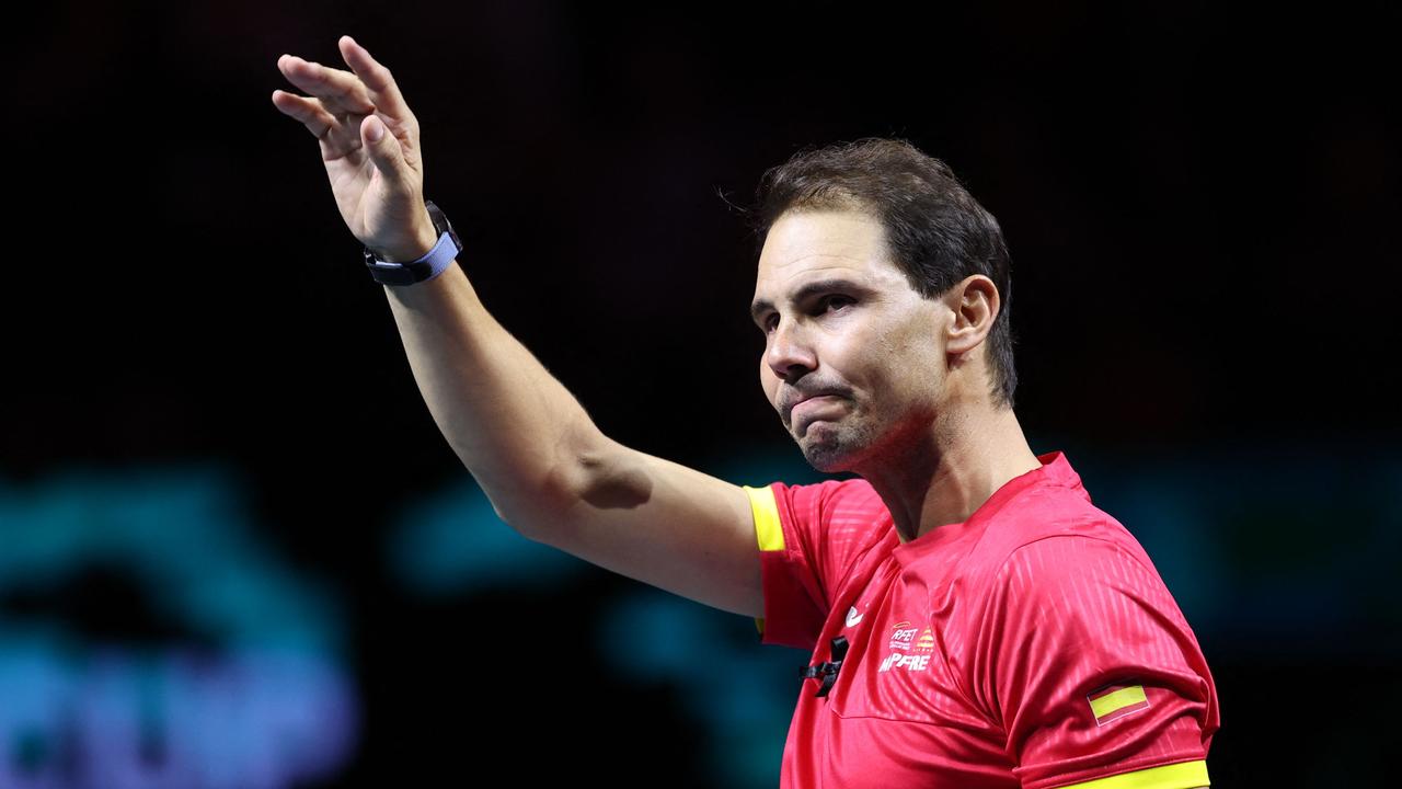 Rafael Nadal waves during a tribute to his career at the 2024 Davis Cup Finals. (Photo by Thomas COEX / AFP)