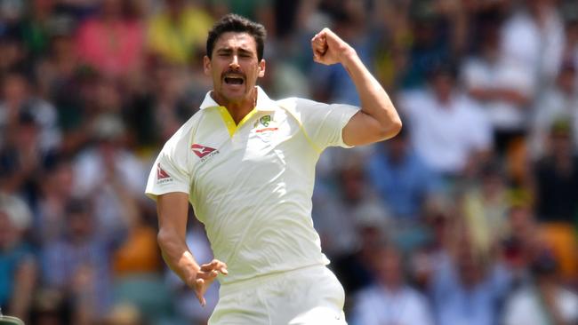 Mitchell Starc of Australia celebrates after claiming the wicket of Alastair Cook of England on Day 1 of the First Test match between Australia and England at the Gabba in Brisbane, Thursday, November 23, 2017. (AAP Image/Darren England) NO ARCHIVING, EDITORIAL USE ONLY, IMAGES TO BE USED FOR NEWS REPORTING PURPOSES ONLY, NO COMMERCIAL USE WHATSOEVER, NO USE IN BOOKS WITHOUT PRIOR WRITTEN CONSENT FROM AAP