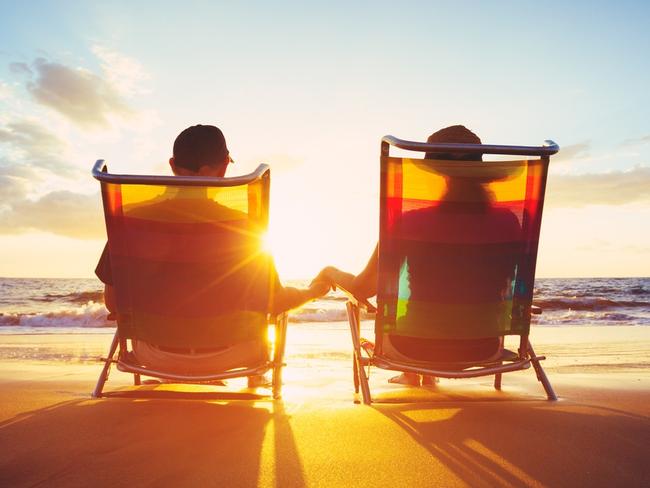 ESCAPE: Romance, Paul Ewart -  Retirement Vacation Concept, Happy Mature Retired Couple Enjoying Beautiful Sunset at the Beach . Picture: iStock