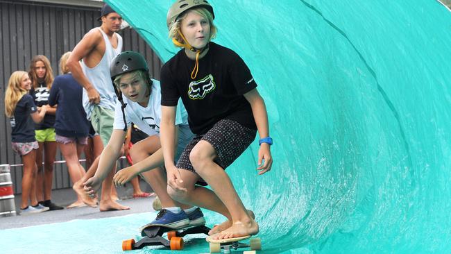 A sign on day for Coffs Harbour Boardriders at the Hoey Moey. Tarp surfing with Marcus Woschitzka and Taj Watson. Picture: Leigh Jensen / The Coffs Coast Advocate