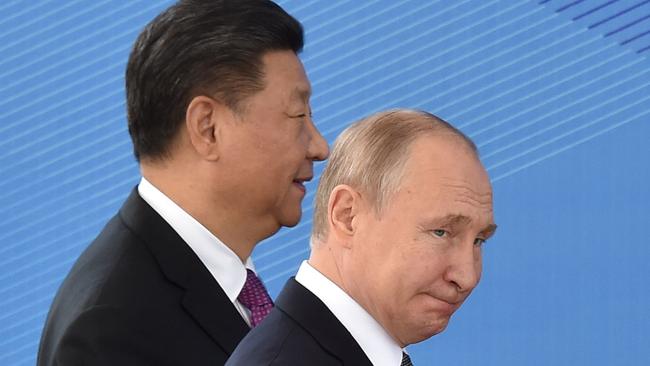 China's President Xi Jinping and Russia's President Vladimir Putin pictured together in 2019. (Photo by Vyacheslav OSELEDKO / AFP)