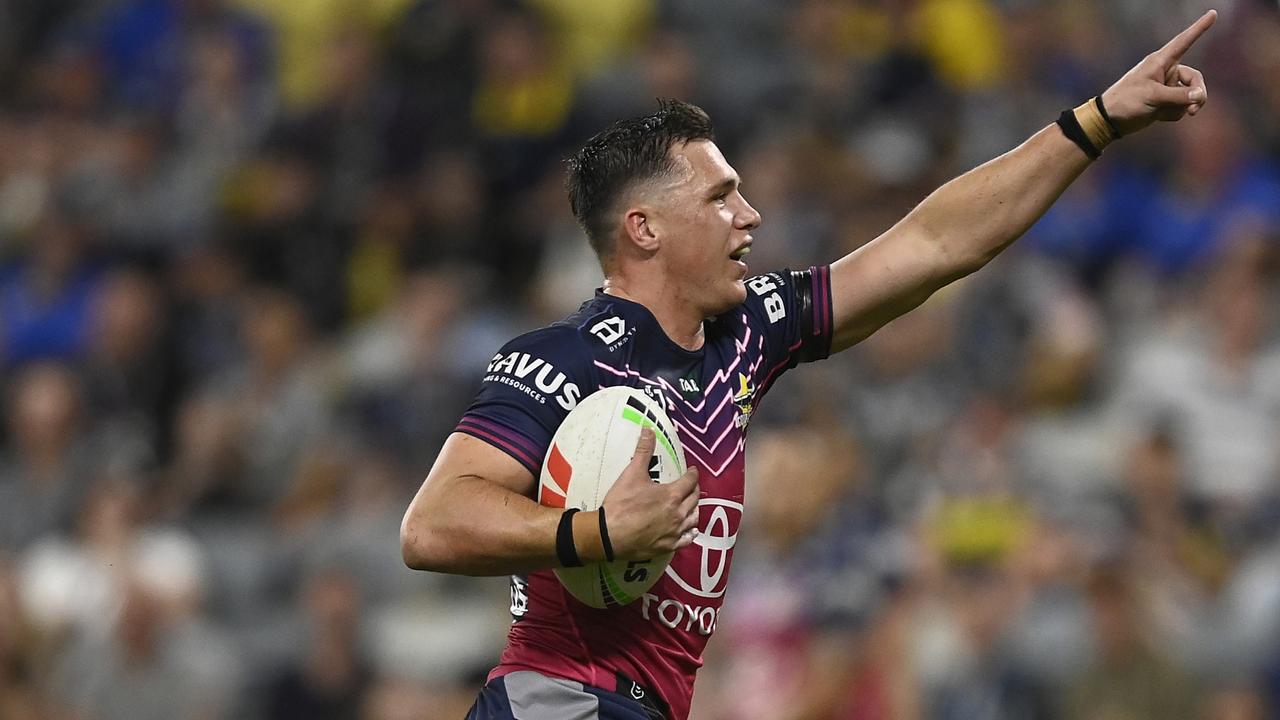 TOWNSVILLE, AUSTRALIA - JULY 22: Scott Drinkwater of the Cowboys runs to score a try during the round 21 NRL match between North Queensland Cowboys and Parramatta Eels at Qld Country Bank Stadium on July 22, 2023 in Townsville, Australia. (Photo by Ian Hitchcock/Getty Images)