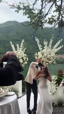 Internet divided after groom sprays bride with bottle of champagne