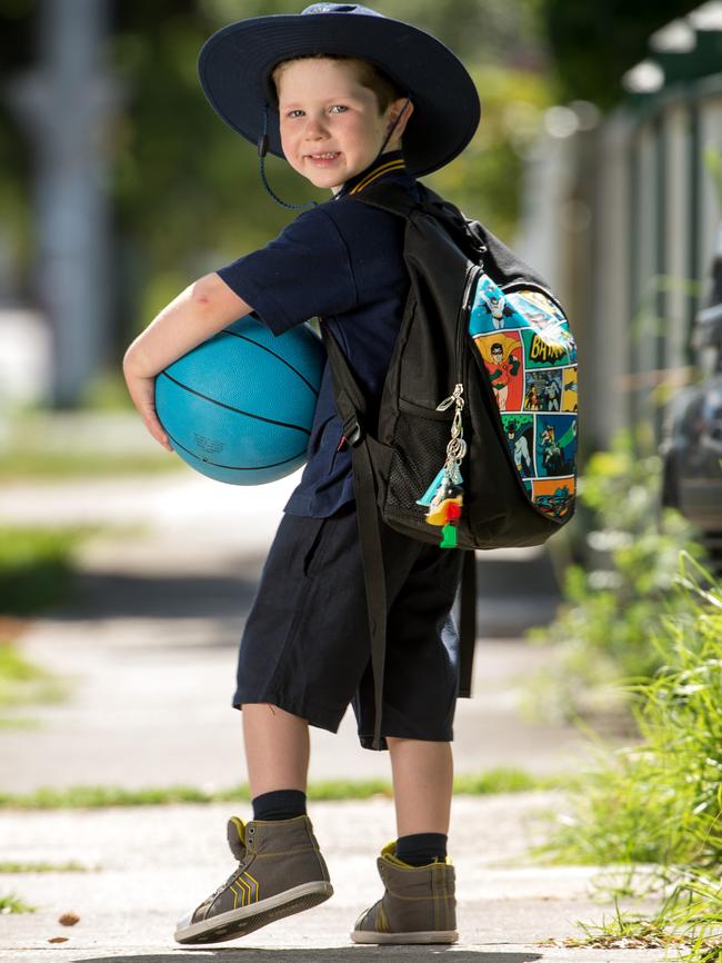 Augustus walks to school. Picture: Jay Town