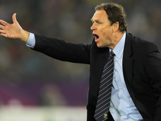 Australia's coach Holger Osieck shouts instructions to his team during the 2011 Asian Cup final football match between Australia and Japan at Khalifa Stadium in the Qatari capital Doha on January 29, 2011. AFP PHOTO / KARIM JAAFAR