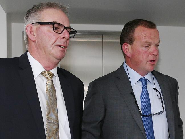 Trainer's (L) Lee Hope and (R) Shannon enter the Racing Victoria hearing into Cobalt use at Racing Victoria HQ, Melbourne. 29th July 2015. Picture: Colleen Petch.