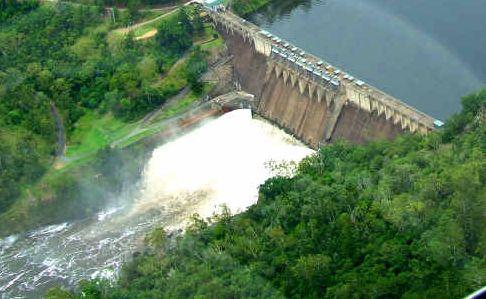 Water gushes from the Somerset Dam in this aerial shot take from a Pterodactyl helicopter. . Picture: Johey Kosta-Jarvis