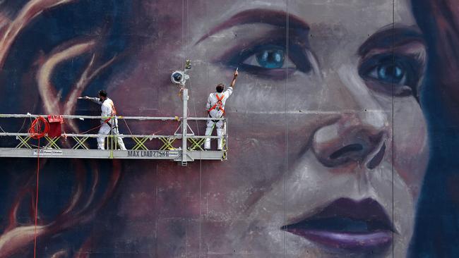 Painters put the finishing touches on the 18-storey mural of Nicole Kidman in Kings Cross on Saturday. Picture: Sam Ruttyn