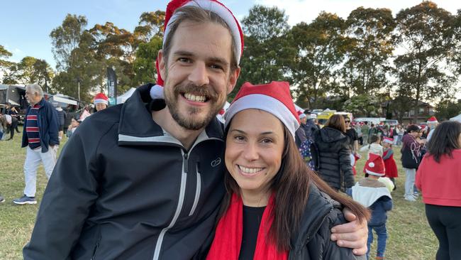 Doncaster's Mitch Drury and Julia Caruso enjoy the festivities at Manningham's 2022 Carols in Doncaster.