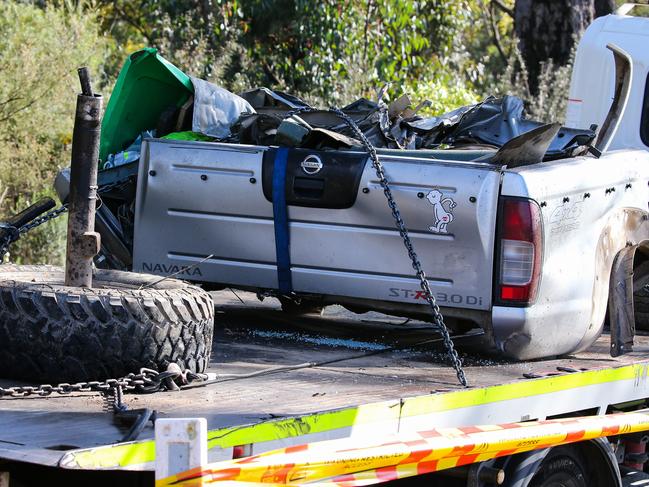 SYDNEY, AUSTRALIA - NEWSWIRE Photos - September 07, 2022: A tow truck driver is seen removing the remains of the car at the crash site where 5 young teenagers were tragically killed in an accident last night at 8pm in Buxton, in Sydney. Picture: NCA Newswire