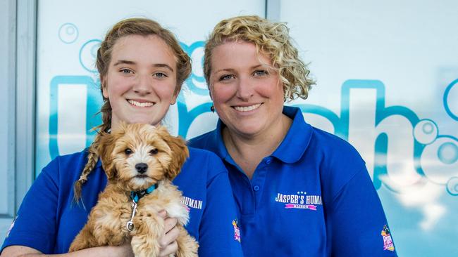 Puppy Academy TV star Jasper the dog with his owners Abbey and Alison.