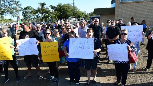 Supporters of sacked Wide Bay Hospital and Health Service chief executive Adrian Pennington rally across the road from Bundaberg Hospital.