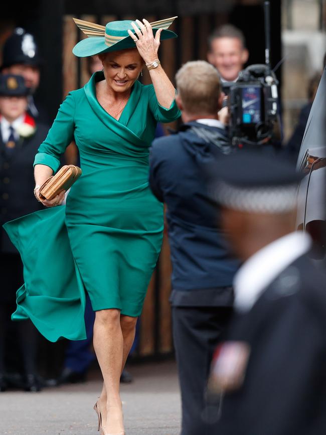 Fergie looks fantastic in bright green and a dramatic hat. Picture: AFP