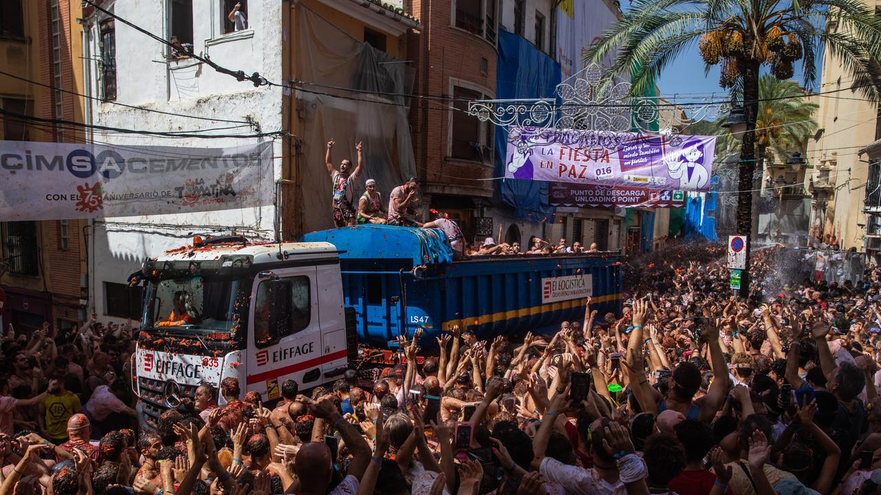 Around 15,000 people thronged the narrow streets of Buñol, usually a quiet town of just 9,500 residents. Picture: Zowy Voeten/Getty Images