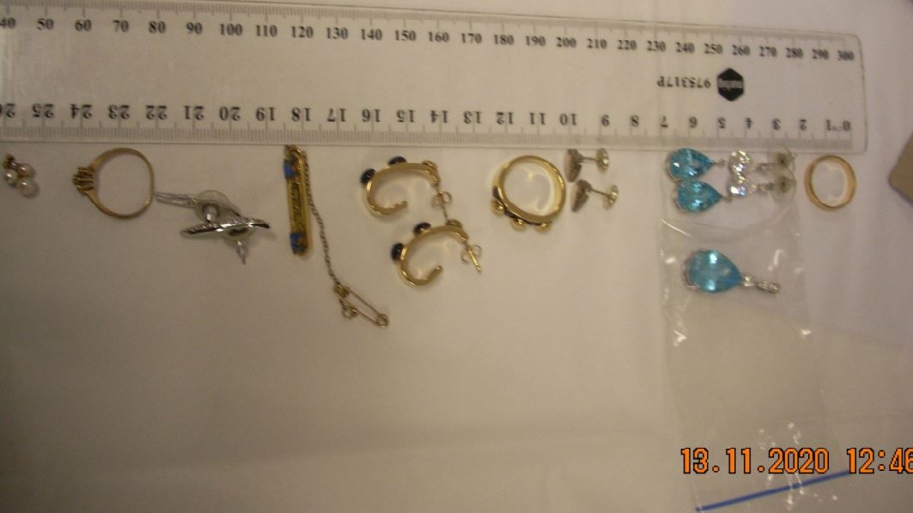 Earrings and rings uncovered in the raid.