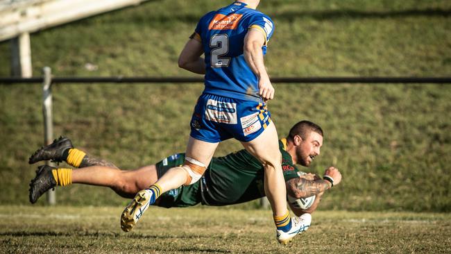 Liam Cassidy dives over for Mittagong. Pics by Julian Andrews.