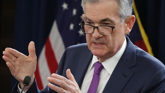 Federal Reserve board chairman Jerome Powell talks to journalists after the rates decision. Pic: AFP