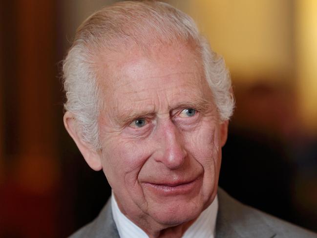 Britain's King Charles III reacts during a ceremony for the Prince's Trust Award 2024 winners and celebrity ambassadors, at Buckingham Palace, in London, on May 22, 2024. (Photo by Chris Jackson / POOL / AFP)