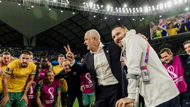 Graham Arnold and his side celebrate Australia’s victory over Denmark in the group stages of the World Cup. Picture: Facebook / Socceroos