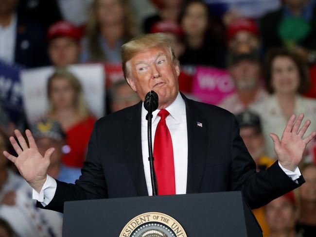 President Donald Trump speaks during a rally for Georgia Republican gubernatorial candidate Brian Kemp Sunday, Nov. 4, 2018, in Macon, Ga. (AP Photo/John Bazemore)