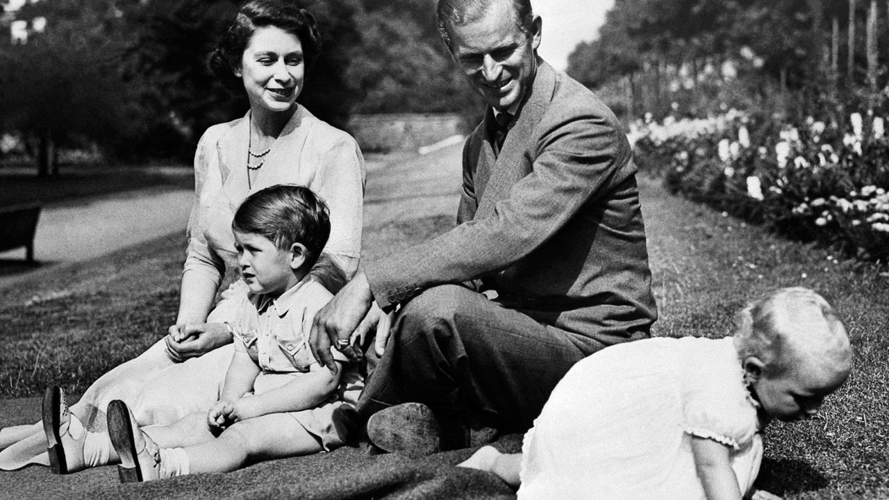 Queen Elizabeth II, Philip and their children, Prince Charles and Princess Anne. Picture: AFP Photo