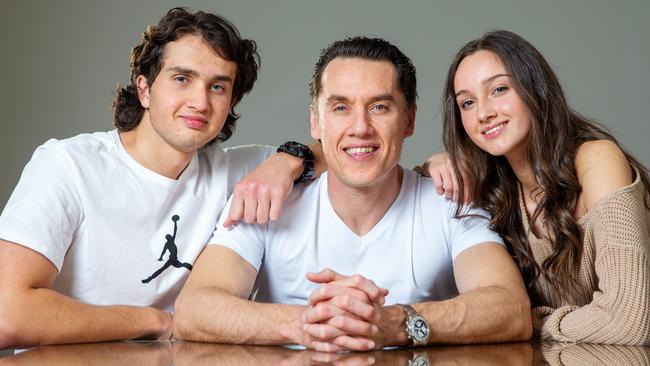 Carlton great Anthony Koutoufides with son, Jamie and daughter Monique. Picture: Mark Stewart