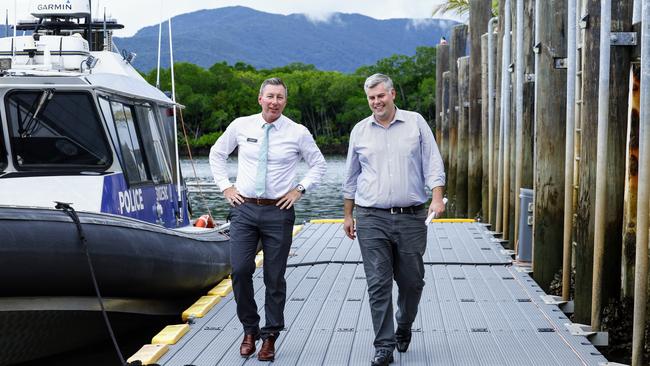 Chief Officer for Marine Rescue Queensland Tony Wulff and Queensland Police Minister Mark Ryan after speaking with Volunteer Coast Guard members at the Cairns Water Police headquarters. Picture: Brendan Radke