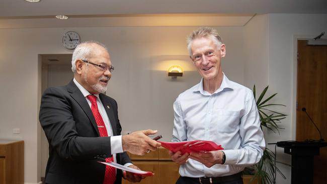 Citra Bangsa School of Kupang's chair Abraham Liyanto and Darwin's Haileybury Rendall School School principal Craig Glass pictured last month