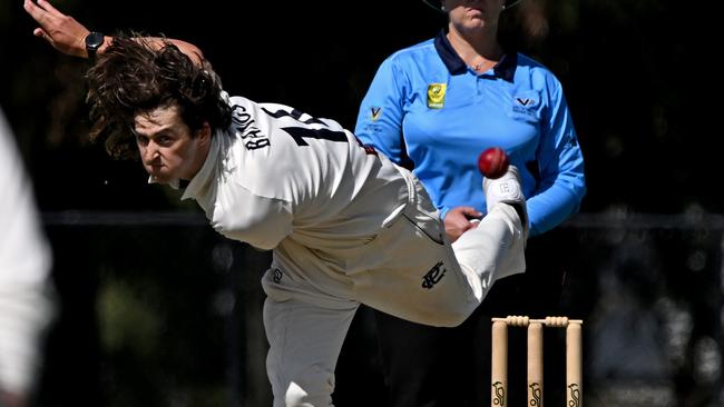 Left-arm medium pacer Bangs sends one down for Prahran. Picture: Andy Brownbill