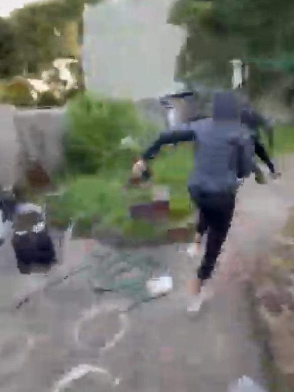 The moment the gang bursts into the backyard. Picture: Supplied.