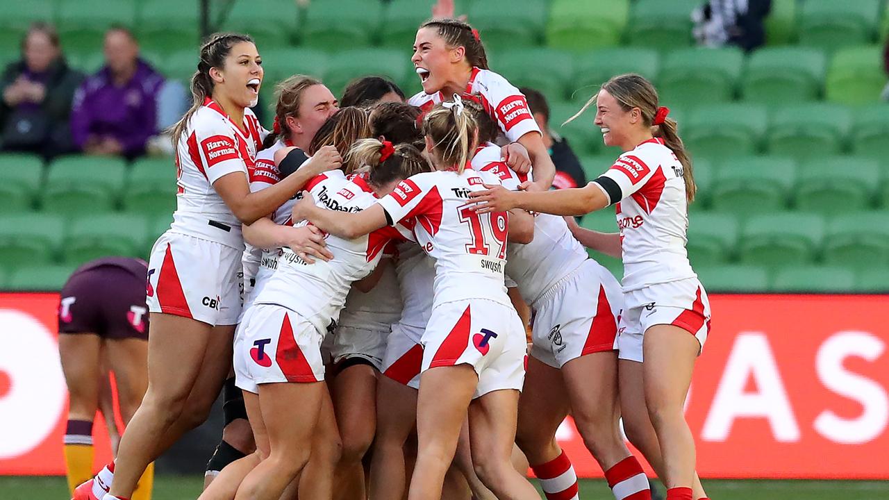 The Dragons swamp Rachael Pearson after she sealed victory in golden point extra time. Picture: Kelly Defina/Getty Images