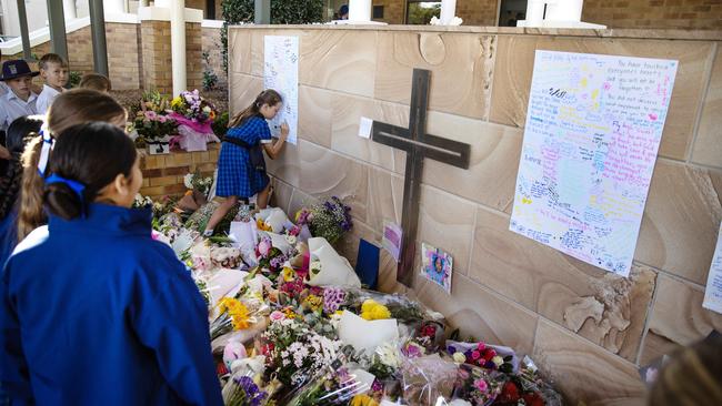 Emmanuel College students leaving tributes to Sophie at the school. Picture: Nigel Hallett.