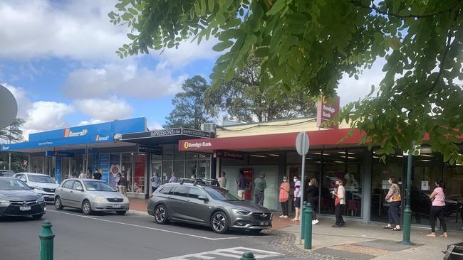 People queuing for Covid-19 rapid tests at an Amcal store in Highton, Victoria.