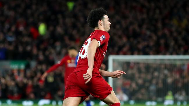 LIVERPOOL, ENGLAND - JANUARY 05: Curtis Jones of Liverpool celebrates after scoring his team's first goal during the FA Cup Third Round match between Liverpool and Everton at Anfield on January 05, 2020 in Liverpool, England. (Photo by Clive Brunskill/Getty Images)