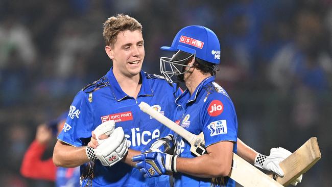 Aussie duo Cameron Green (L) and Tim David are both big-earners in the IPL with Mumbai Indians. Picture: AFP