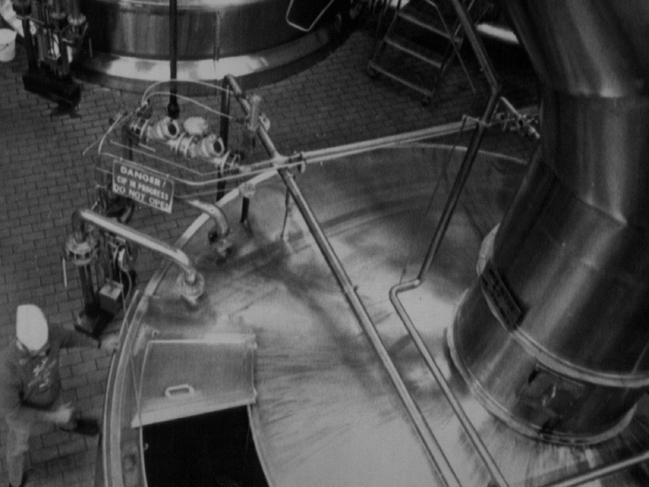 JUN 6 1990; Stroh Brewery Company; (MX3-June 5)--Special for the Denver post/ John Epperson--Worker inspects one of the brew kettles at the Stroh Brewery in Memphis. (jlf31625/Karen Pulfer Focht) 1990 1989 filer (Photo By The Denver Post via Getty Images)