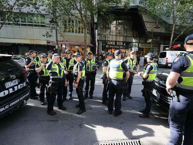 Police heavily monitor the scene. Picture: Alex Coppel.