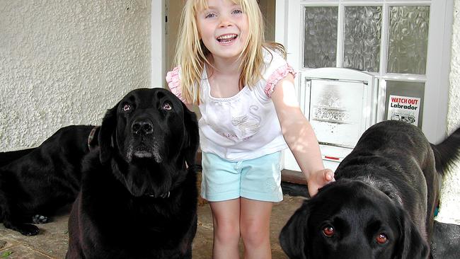 Angela Mollard's daughter has always been keen on dogs. I wish I got her one. Picture: Supplied