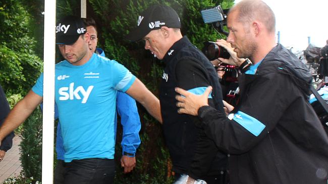 Britain's Christopher Froome injured arrives at his hotel in Marcq-en-Barœul.