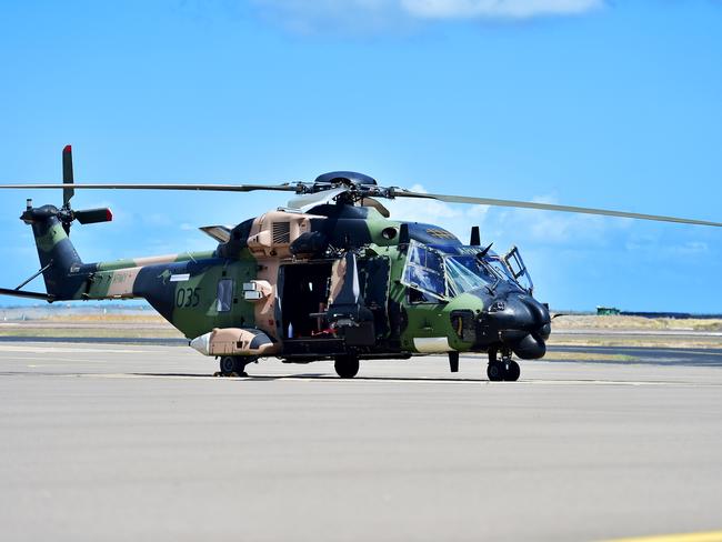 Members of the Australian Defence Force in Townsville departing by MRH-90 Taipans to assist with the Bushfires down south. Picture: Alix Sweeney