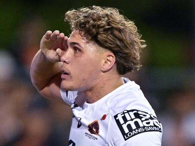 SYDNEY, AUSTRALIA - APRIL 27: Reece Walsh of the Broncos celebrates scoring a try during the round eight NRL match between Wests Tigers and Brisbane Broncos at Campbelltown Stadium, on April 27, 2024, in Sydney, Australia. (Photo by Izhar Khan/Getty Images)