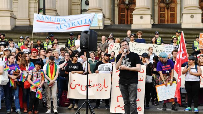 Protesters rally at State Parliament against the Manus Island Detention centre. Picture: Jake Nowakowski