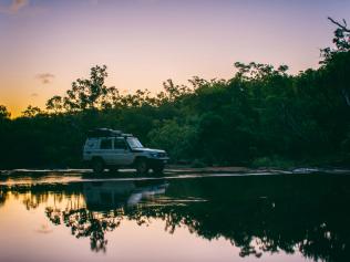 Driving over water crossing in Cape York. Picture: Tourism Tropical North Queensland