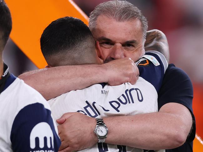 Postecoglou embraces Pedro Porro after the miracle win. Picture: Ryan Pierse/Getty Images