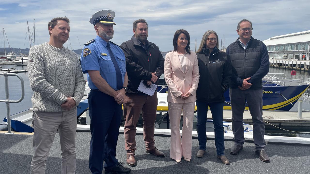 From left, Department of Natural Resources and Environment Tasmania (NRE Tas) manager of wild fisheries Wetjens Dimmlich, Inspector Steve Watson of Tasmania Police, IMAS fisheries professor Sean Tracey, Primary Industries and Water Minister Jo Palmer, TARFish Tasmania CEO Jane Gallichan and NRE Tas secretary Jason Jacobi, at the state government's announcement of a ban on commercial flathead fishing and a drastic reduction in recreational bag limits