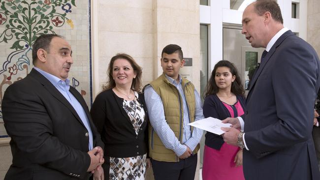 Osama Butti and his family meet with Peter Dutton. Picture: Ella Pellegrini.